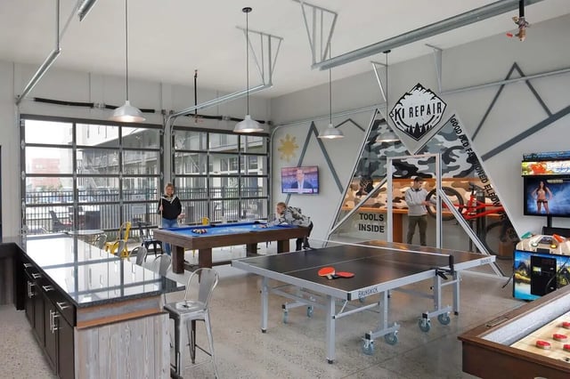 Pool table ping pong table shuffleboard recreation area at The Arrow Townhomes & Flats in Bozeman Student Accommodation