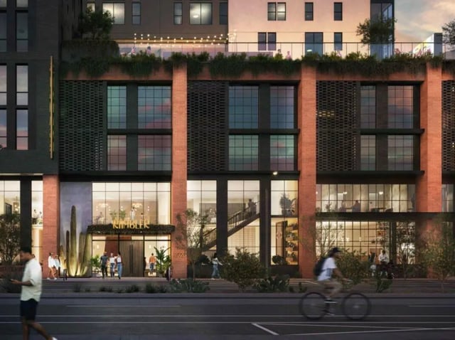 Modern building entrance with people and plants exterior at Rambler Tempe Apartments in Tempe Student Accommodation