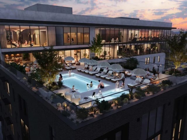 Pool lounge area with people enjoying recreation exterior at Rambler Tempe Apartments in Tempe Student Accommodation