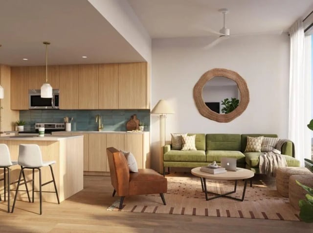 Kitchen counter stools sofa and coffee table living room at Rambler Tempe Apartments in Tempe Student Accommodation