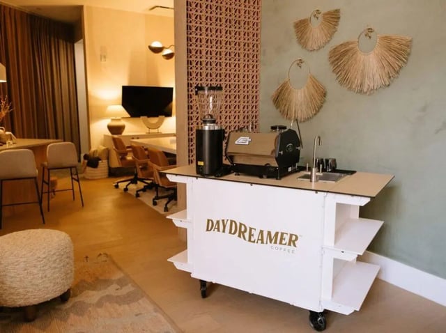 Coffee cart with espresso machine sink and grinder common area at Rambler Tempe Apartments in Tempe Student Accommodation