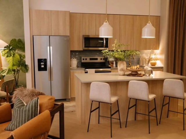 Modern kitchen with island and bar stools kitchen at Rambler Tempe Apartments in Tempe Student Accommodation