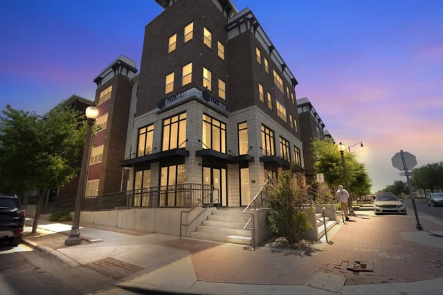 Building with large windows and trees exterior at Park East Student Living in Lubbock Student Accommodation