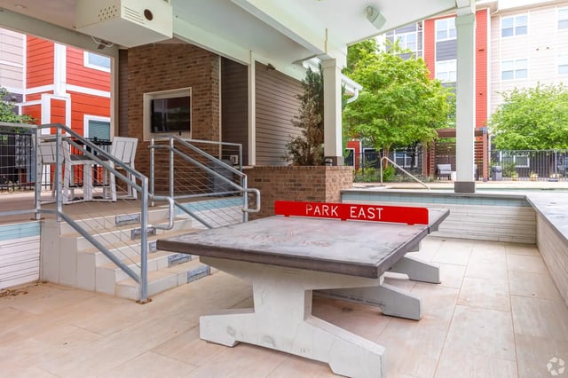 Ping pong table outdoor recreation area exterior at Park East Student Living in Lubbock Student Accommodation