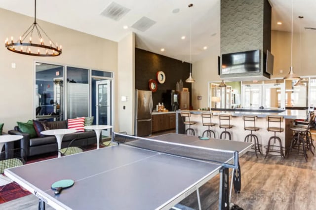 Ping pong table, sofa, bar, kitchen area at Stadium View in Jonesboro Student Accommodation