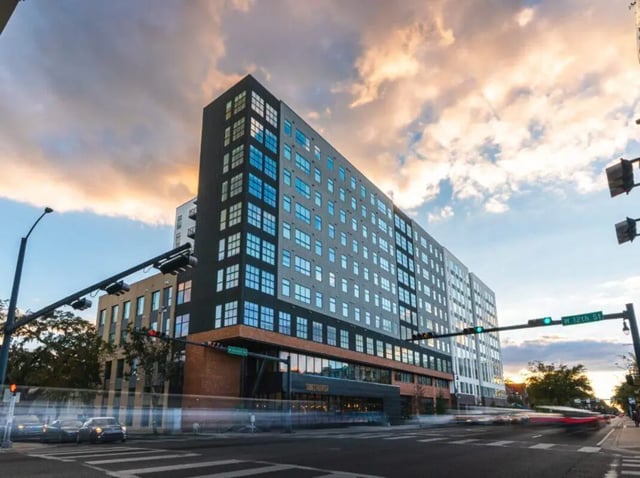 Modern building with many windows exterior exterior at Sweetwater Gainesville Apartments in Gainesville Student Accommodation