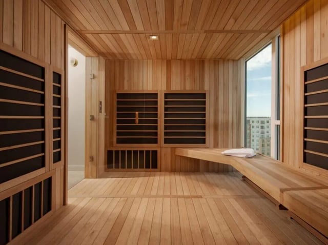 Wooden sauna with bench and window Sauna at Sweetwater Gainesville Apartments in Gainesville Student Accommodation