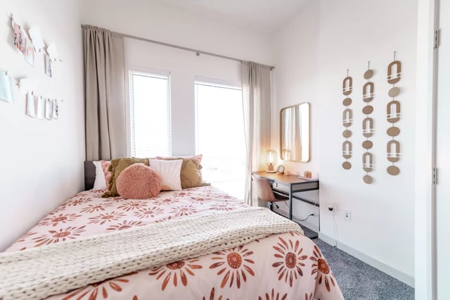 Bed desk mirror and wall decor bedroom at Lapis in Miami Student Accommodation