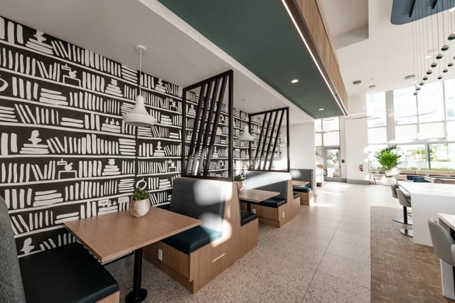 Book theme booths with tables communal area at Lapis in Miami Student Accommodation