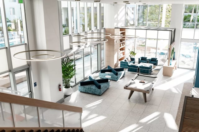 Modern lounge area with pool table and seating. at Lapis in Miami Student Accommodation
