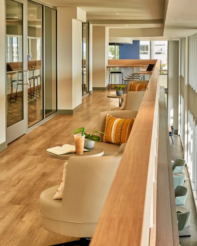 Chairs with pillows book and drink study area at Lapis in Miami Student Accommodation