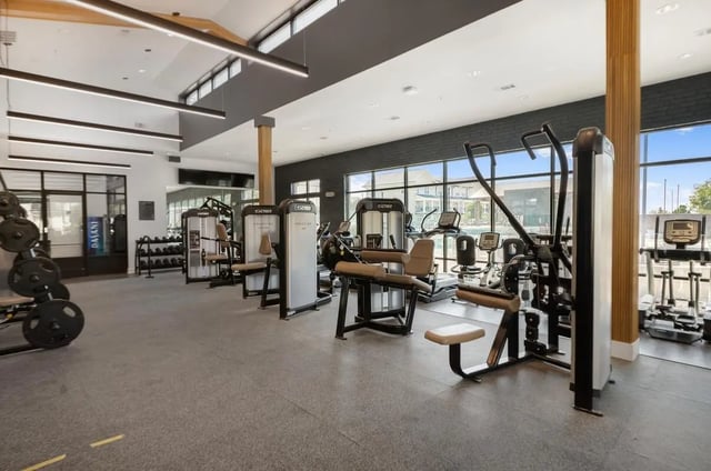 Weight machines treadmills and elliptical gym area at Wildwood Lubbock in Lubbock Student Accommodation