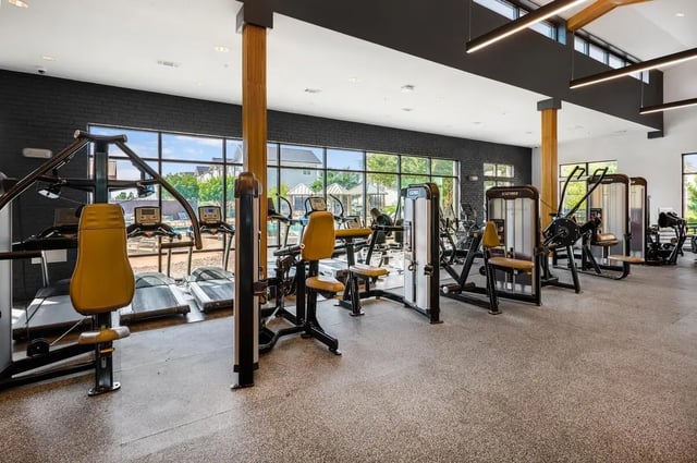 Gym equipment treadmills and weight machines fitness area at Wildwood Lubbock in Lubbock Student Accommodation