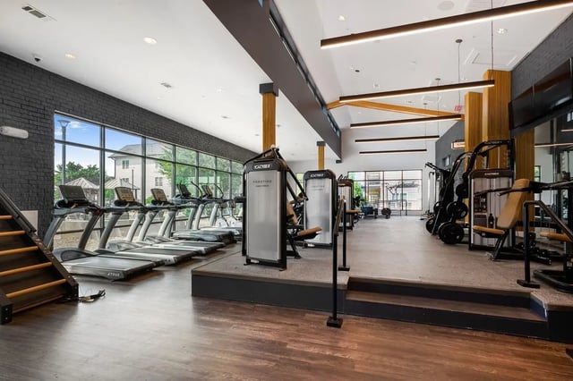 Treadmills weight machines and steps gym at Wildwood Lubbock in Lubbock Student Accommodation
