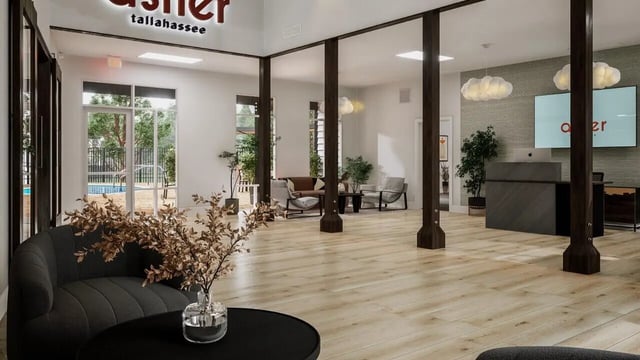 Lounge seating reception desk and pool exterior at The Asher in Tallahassee Student Accommodation