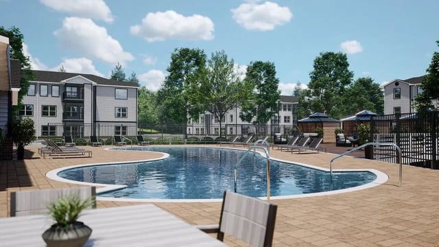Curving pool lounge chairs gazebos student housing exterior at The Asher in Tallahassee Student Accommodation