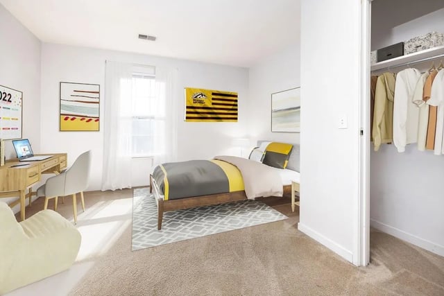 Bed desk closet and beanbag bedroom at The Tate on Howard in Kalamazoo Student Accommodation