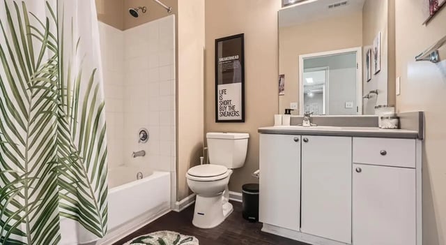 Shower tub toilet vanity with sink bathroom at The Flats at Atlantic Station in Atlanta Student Accommodation