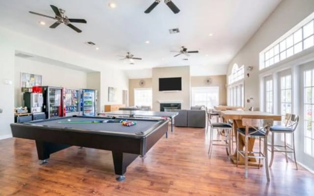 Pool table vending machines ping pong tables high tables lounge area game room at The Pointe at Central in Orlando Student Accommodation