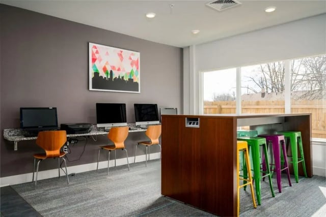 Computers printer and stools study area at The Rocks in East Lansing Student Accommodation