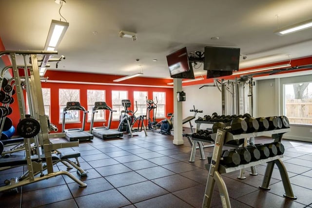Weight racks treadmills elliptical gym Image Type at The Rocks in East Lansing Student Accommodation