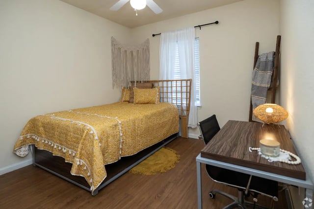 Bed desk lamp macrame tapestry bedroom at Forum at Tallahassee in Tallahassee Student Accommodation