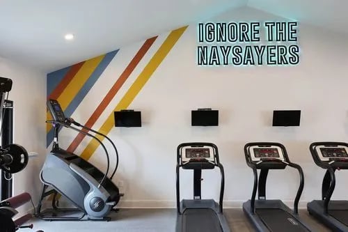 Treadmills stair climber weight machine gym area at The Roost in Columbia Student Accommodation