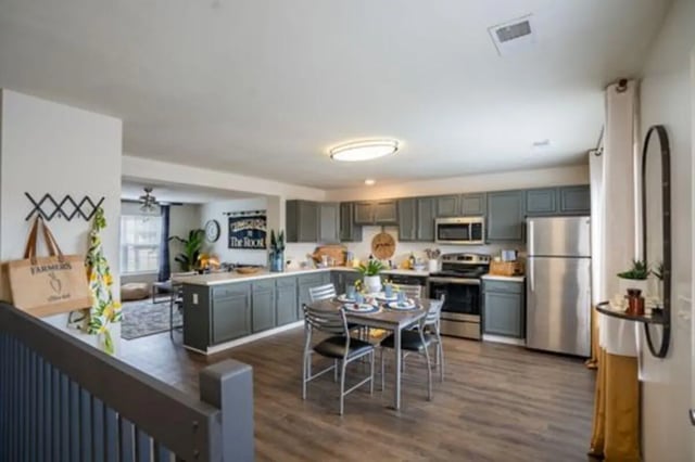 Modern kitchen with dining table and appliances kitchen at The Roost in Columbia Student Accommodation