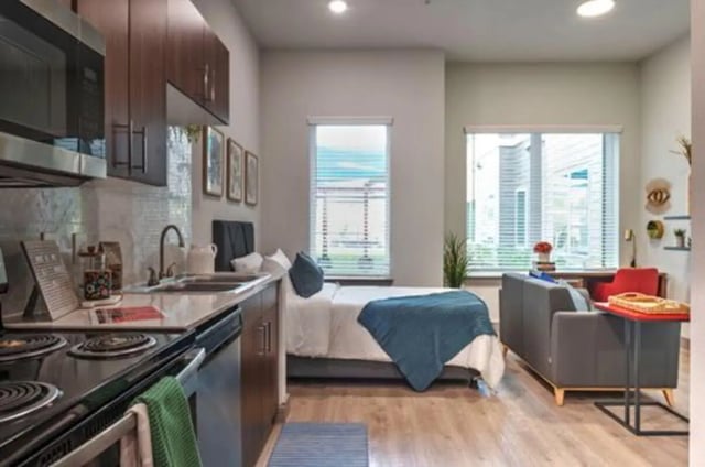 Kitchen bed couch and desk area studio at The Icon & Lofts at the Icon in Houston Student Accommodation