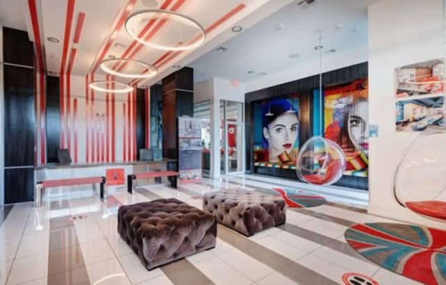 Lounge with seating and art lounge area at The Icon & Lofts at the Icon in Houston Student Accommodation
