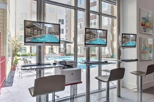 Computers printer and chairs study area at The Icon & Lofts at the Icon in Houston Student Accommodation