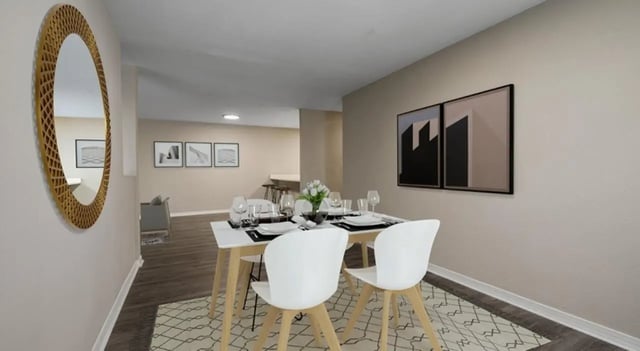 Dining table with chairs and mirror dining area at 403 West in Raleigh Student Accommodation