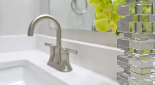 Sink faucet and clear decorative object bathroom at 403 West in Raleigh Student Accommodation