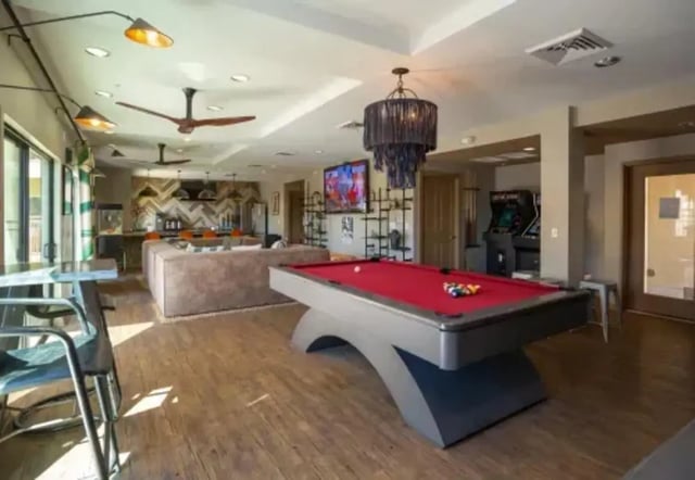 Pool table arcade games lounge area living room at The Junction At Iron Horse Student Housing in Tucson Student Accommodation