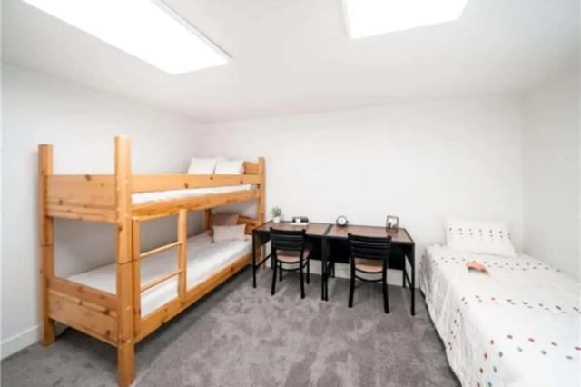 Bunk beds two desks single bed bedroom at Bountiful Court Apartments in Provo Student Accommodation