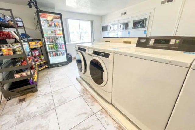 Vending machines and washing machines laundry room at Bountiful Court Apartments in Provo Student Accommodation