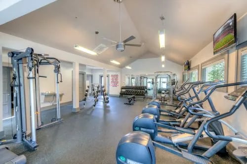 Weight machines elliptical trainers and dumbbells fitness area at The Reserve San Antonio in San Antonio Student Accommodation