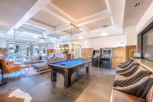 Pool table arcade games seating living room at The Reserve San Antonio in San Antonio Student Accommodation