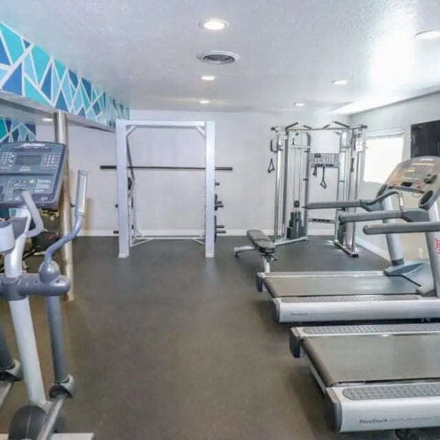 Treadmills elliptical weight rack gym fitness area at Campus Way in Provo Student Accommodation