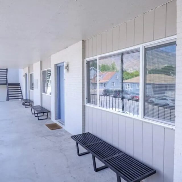 Hallway with benches and windows exterior at Campus Way in Provo Student Accommodation