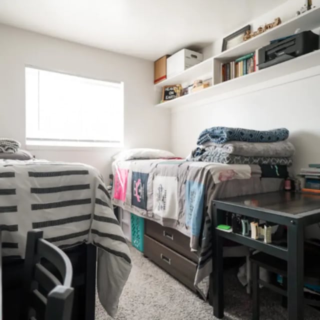 Two beds desk and shelves bedroom at Campus Way in Provo Student Accommodation
