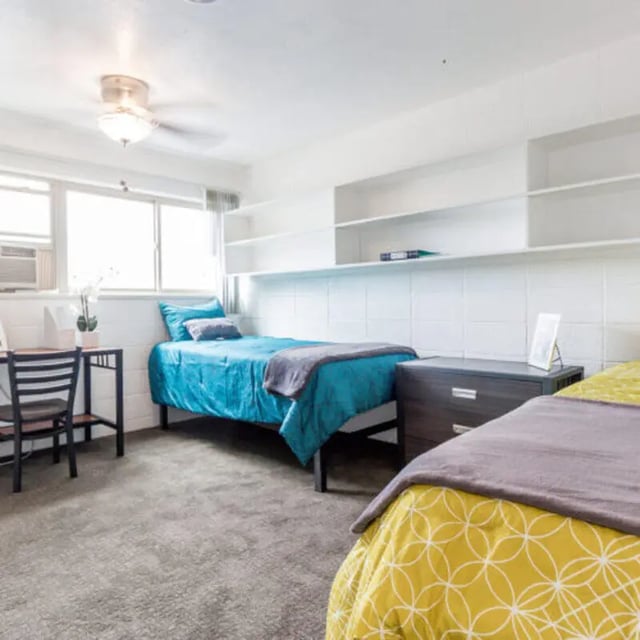 Two beds desk shelving bedroom at Campus Way in Provo Student Accommodation