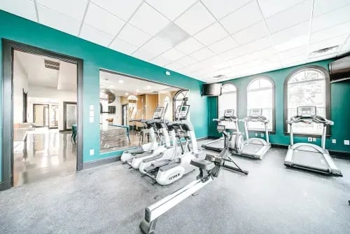 Treadmills ellipticals rowing machine gym area at The Letterman Greensboro in Greensboro Student Accommodation