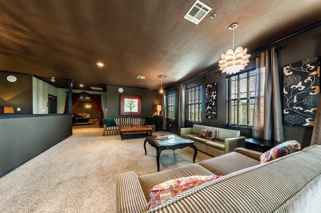 Sofas coffee table artwork living room at The Reserve at College Station in College Station Student Accommodation