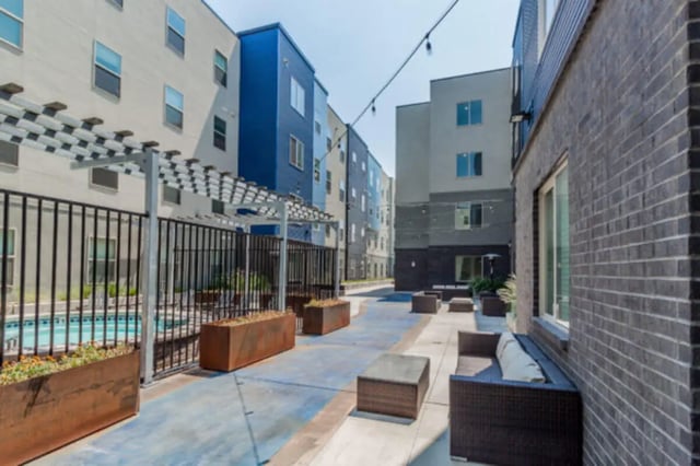 Courtyard with seating pool and planter boxes exterior at CollegePlace Provo in Provo Student Accommodation