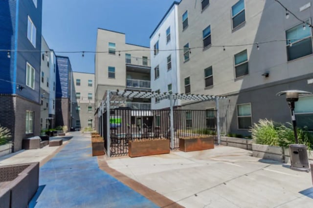 Modern buildings outdoor seating planters patio area exterior at CollegePlace Provo in Provo Student Accommodation