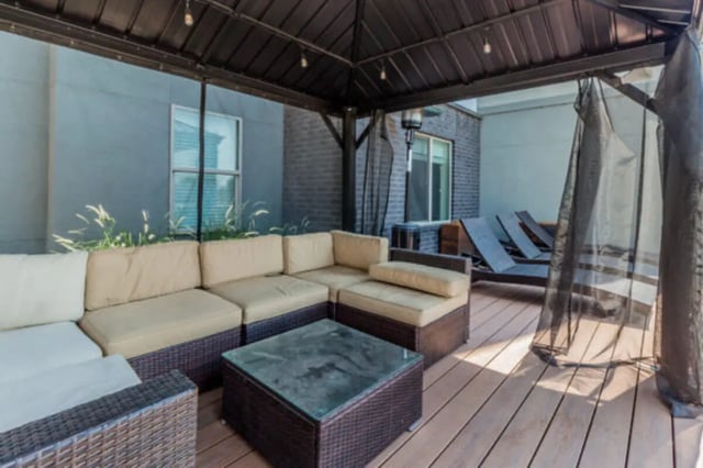 Outdoor lounge seating and coffee table patio at CollegePlace Provo in Provo Student Accommodation