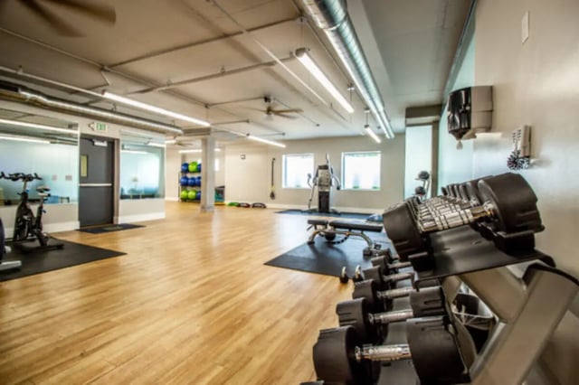 Dumbbells exercise bikes and weights gym at CollegePlace Provo in Provo Student Accommodation