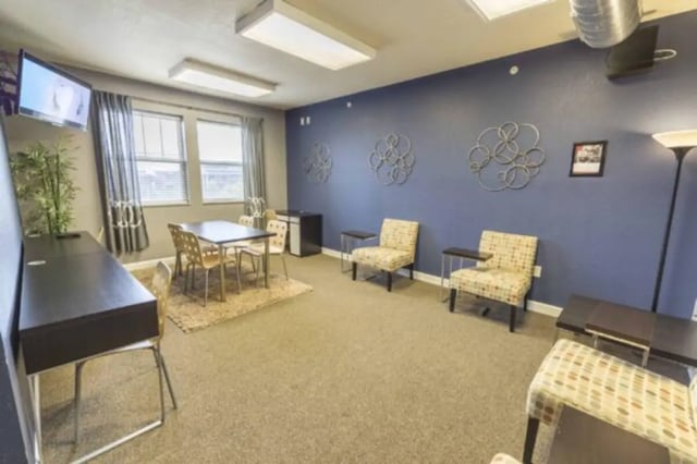 Desk chairs table chairs lounge living room at CollegePlace Uptown