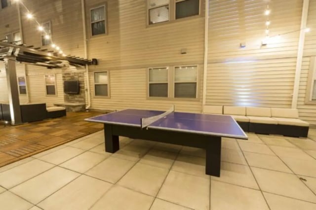 Ping pong table sofas and seating area outdoor space at CollegePlace Uptown